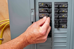 Checking the circuit breaker to see if it’s on | Gibber Services
