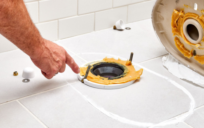 Repairing damaged toilet flange due to water leakage