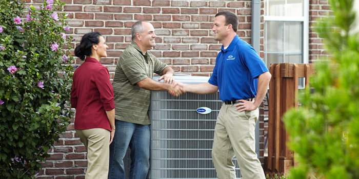 Happy homeowners for receiving quality HVAC services
