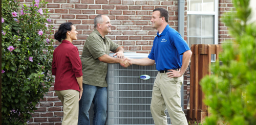Happy homeowners for receiving quality HVAC services